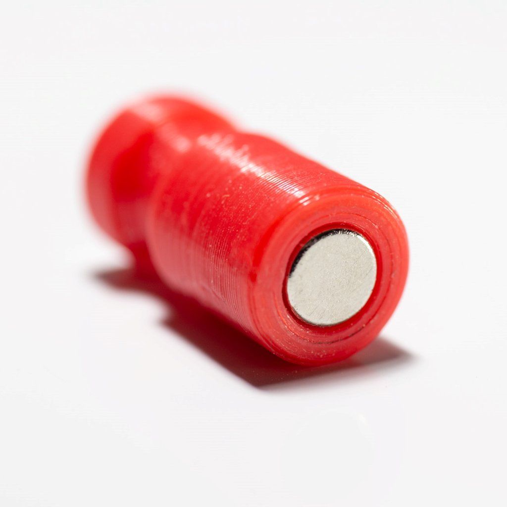 Very strong red magnet in a plastic case without print