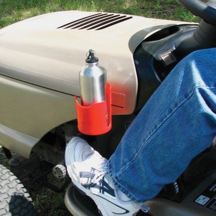 Red magnetic cup and bottle holder for a steel surface