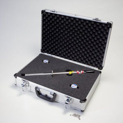Magnetic testing rod approximately 30 mm in diameter, supplied in a protective case
